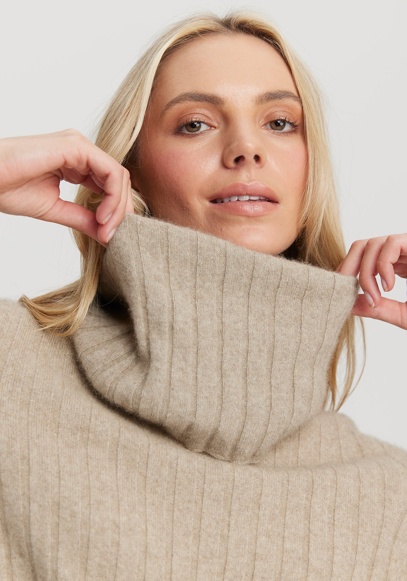The Kapua Rib Snood from Untouched World available shopology Chrstchurch, CBD. This classic rib snood is a perfect accompaniment to anyone of your favourite kapua sweaters. Designed to wear with UTW's Kapua Rib Crew, it instantly transforms a crew neckline into a rollneck. Just what you need on icy winter days when you want to keep the cold at bay. Made from our exclusive Kapua blend of 40% Premium Possum Fibre, 40% Cashmere and 20% Mulberry Silk