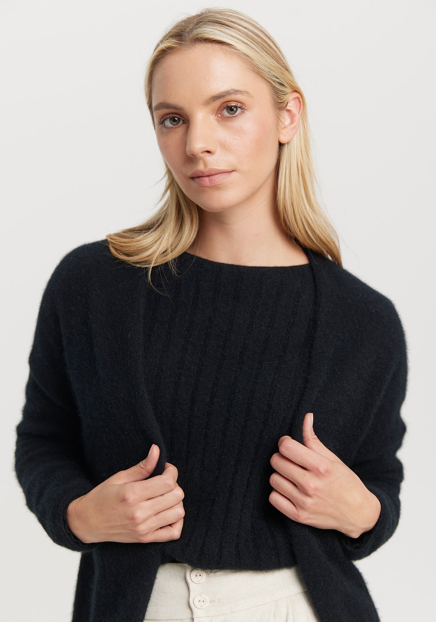 Cosy Cardi from Untouched World available shopology Christchurch CBD.  This cosy cardi is effortless style and elegance all rolled into one silky soft cover up. Throw it on when you need a layer of warmth and instantly elevate your look.  Made from UTW's exclusive Kapua blend of 40% Premium Possum Fibre, 40% Cashmere and 20% Mulberry Silk Pill resistant Regular fit