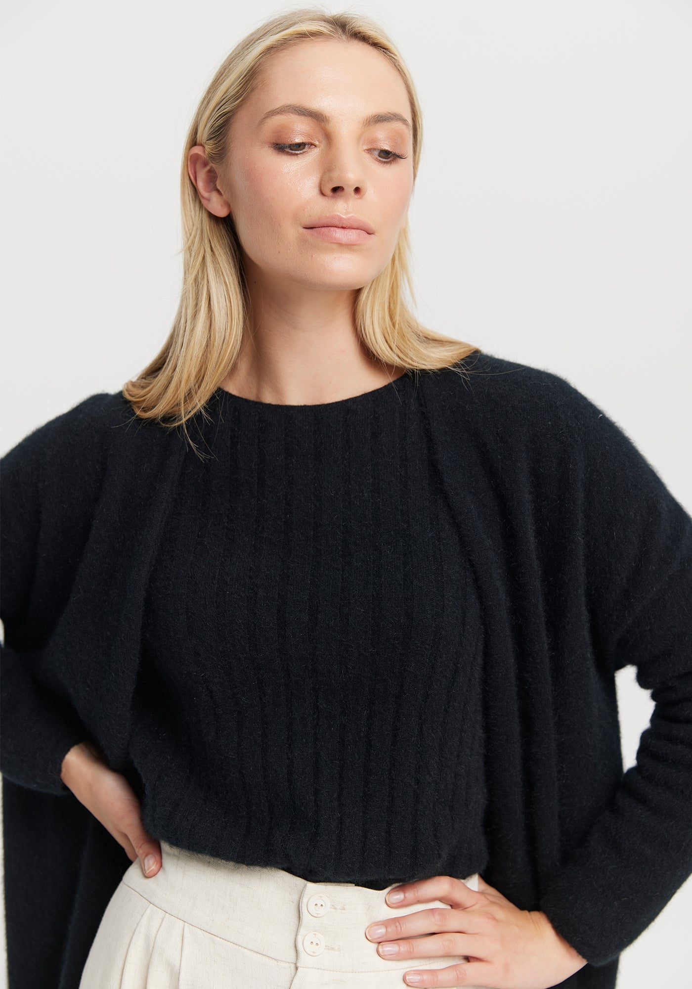 Cosy Cardi from Untouched World available shopology Christchurch CBD. This cosy cardi is effortless style and elegance all rolled into one silky soft cover up. Throw it on when you need a layer of warmth and instantly elevate your look. Made from UTW's exclusive Kapua blend of 40% Premium Possum Fibre, 40% Cashmere and 20% Mulberry Silk Pill resistant Regular fit
