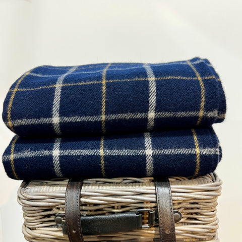 Buy this beautiful Blue tartan blanket, made from 100% soft pure lambs wool, grown, spun and woven entirely in New Zealand.  Perfect as a comforter for a double or queen bed, a throw on the sofa or to keep warm in the car as a travel rug. Available at www.shopology.co.nz