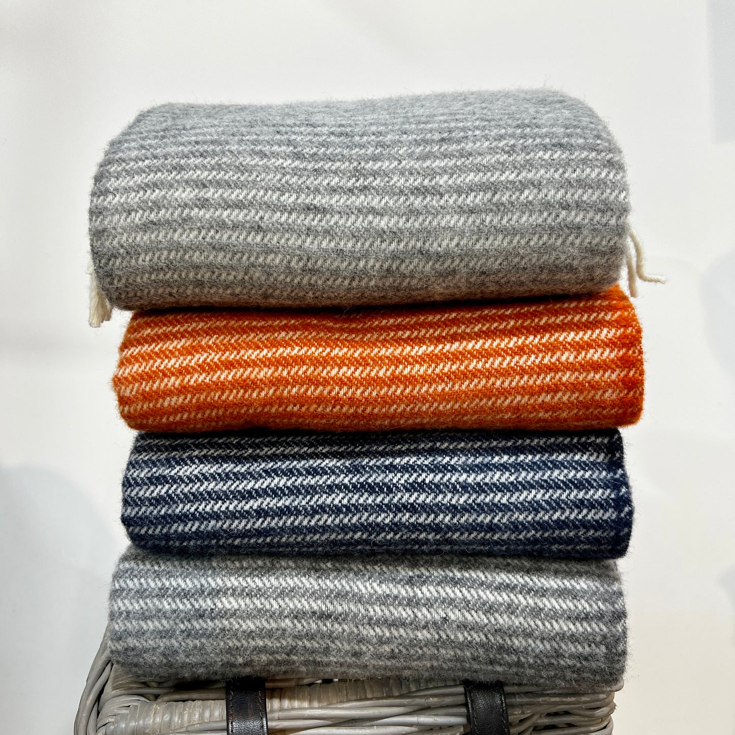 These beautiful and luxurious woven wool throws or blankets are made with New Zealand lambswool which can be traced back to the individual farm. The Ralph blanket features a subtle woven pattern with contrasting cream fringing. Soft and cosy lambswool has been sourced from sheep farmers in New Zealand using high, eco-friendly standards. They keep you warm on cold winter days or nights and become a nice and timeless detail on your sofa or bed. Available at www.shopology.co.nz