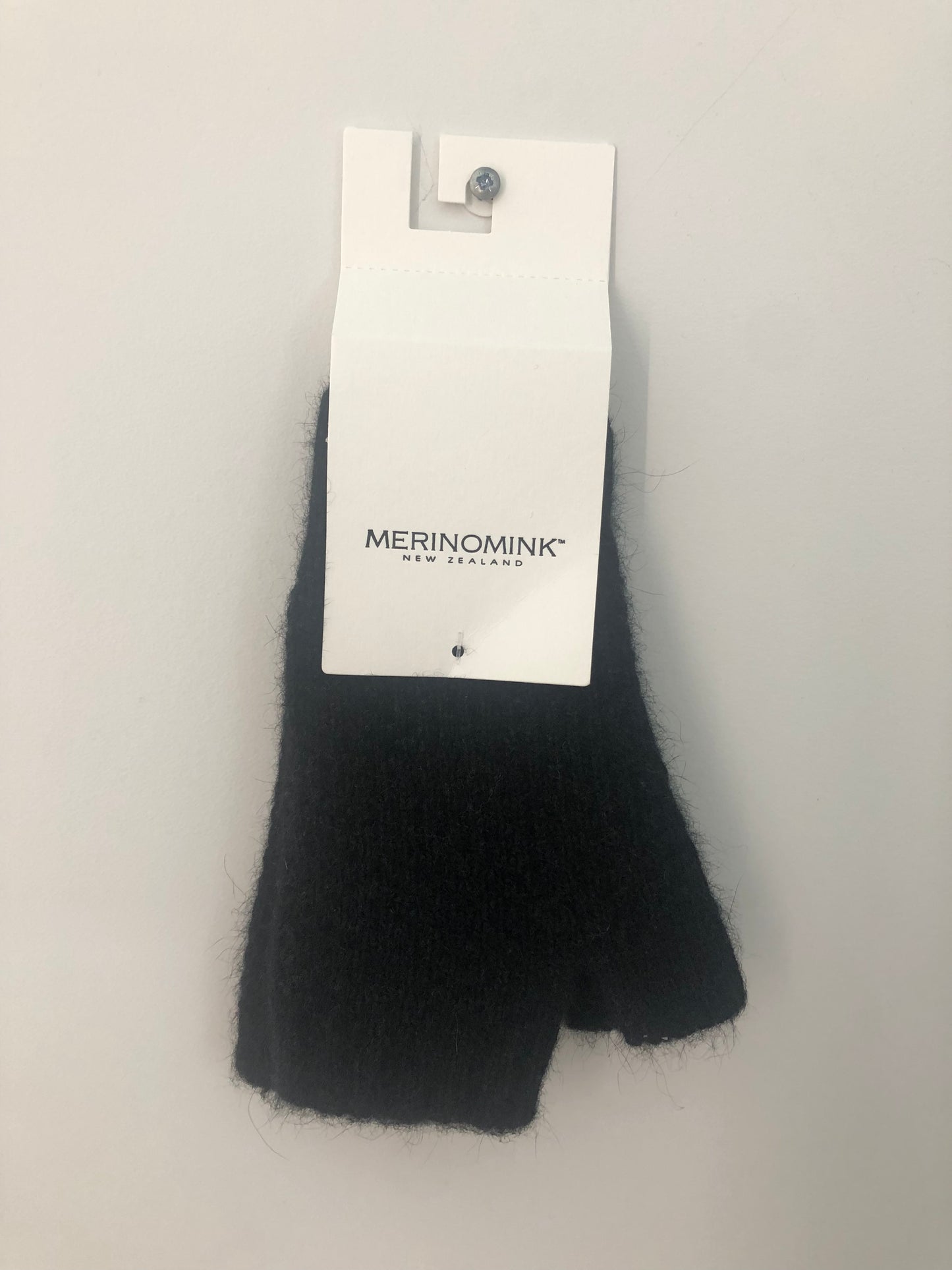 Finley Handwarmer Merinomink available shopology. Made locally in Christchurch, New Zealand. Don't let cold hands get in the way of your day with the Finley Handwarmer. Keeping hands warm and fingers free with Untouched Worlds signature Merinomink blend of ZQ certified merino, possum and silk. 50% merino, 40% possum, 10% mulberry silk Style no. 0591