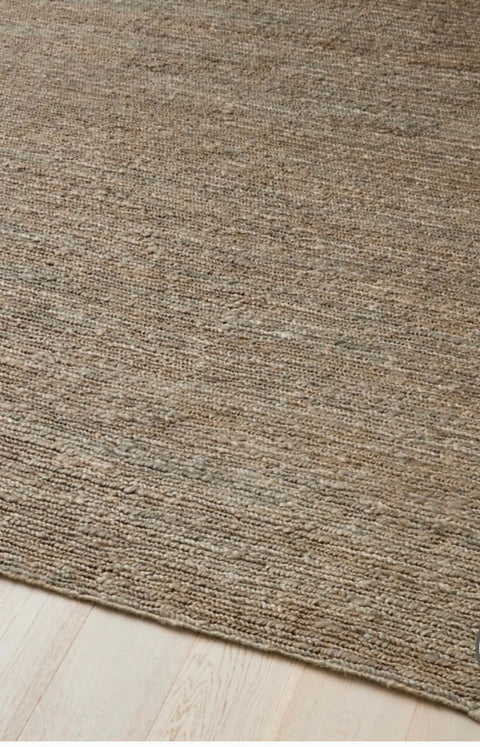 Available exclusive shopology, Christchurch CBD. Hand-woven natural Jute rug with a mirrored stripe pattern 100% chunky Jute Very hard-wearing, suitable for high-traffic living, including living rooms or under a dining room table. 2m x 3m The tightness of the weave creates a hard-wearing and durable rug that is suitable for use in any area of the home — it is also kid-friendly.