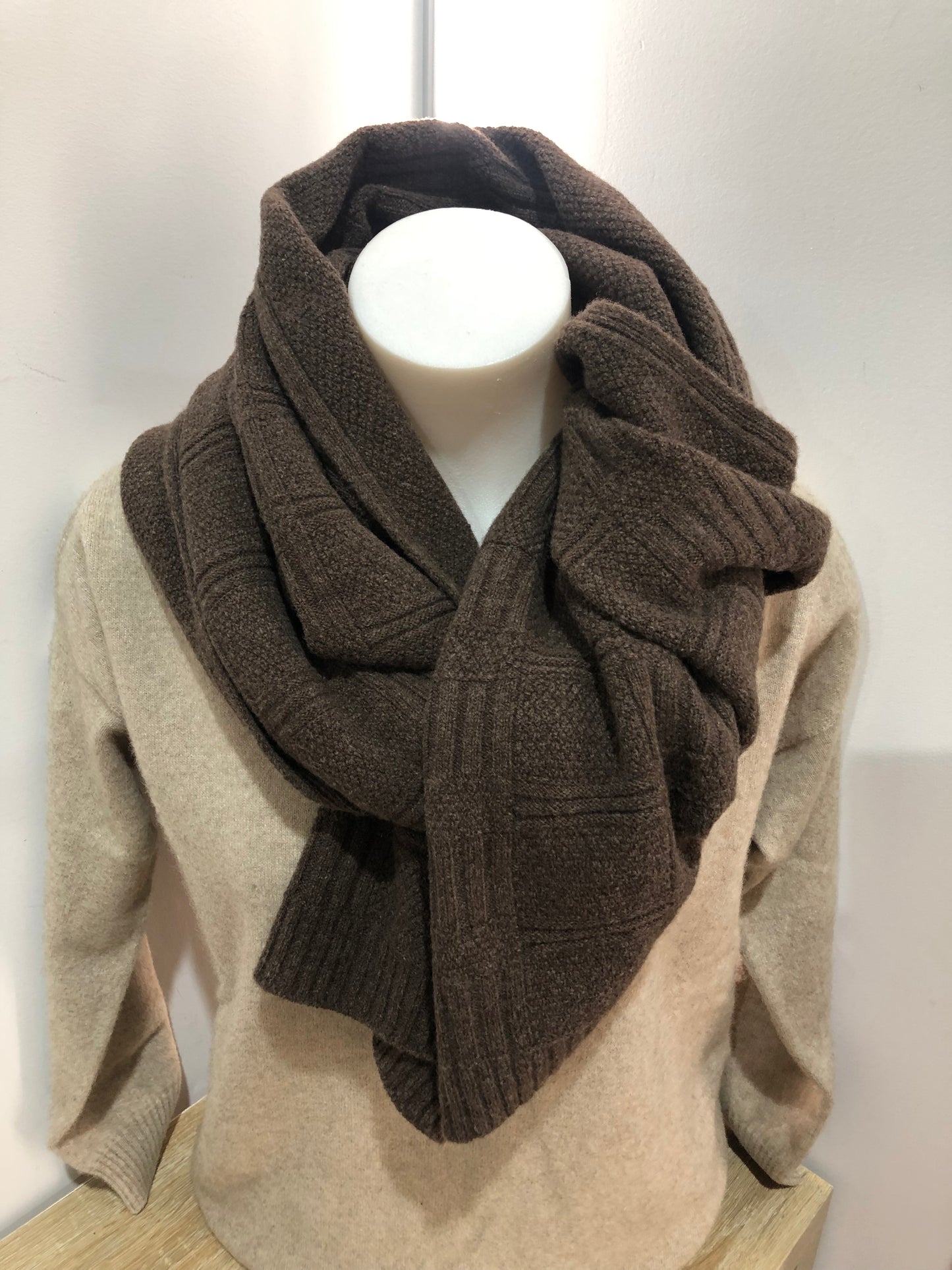 Natural Merino wrap scarf available exclusively shopology Christchurch CBD. Natural, sustainable & traceable... Beautiful Merino knitted Basket-weave wrap scarf proudly made in New Zealand. The rear naturally coloured Merino comes in shades of chocolate to silver. A wonderful gift from New Zealand. Size: length 220cm, width 45cm