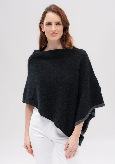 Two-tone Poncho Merino Mink available shopology, CBD, One colour is never enough in this amazing one-size-fits-Poncho. This easy throw-on piece can be worn various ways to create a different look. A touch of contrast tipping at the hem adds a little designer detail. 50% merino, 40% possum, 10% mulberry silk Multi-way Contrast colour tipping Cropped length, made in New Zealand, local, Canterbury