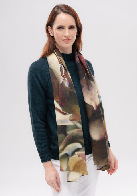  Botanical Print Scarf, Merinomink available shopology. This luxe wool scarf is embellished with a botanical print, drawing from a palette of rich, earthy tones. A seasonless essential, it will add warmth, a little flair and the finishing touch to any outfit.  Made from 100% wool Botanical print : Hydrangea, Orange Dahlia, Red Dahlia Microplastic-free Made in Christchurch, New Zealand Available in one size Style no. 600064