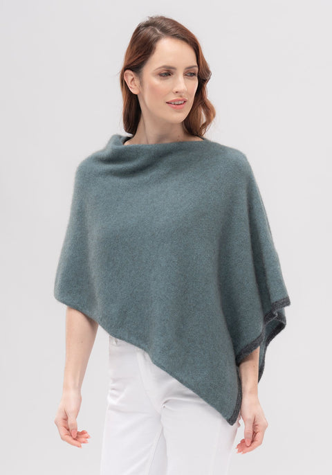 Two-tone Poncho Merino Mink available shopology, CBD, One colour is never enough in this amazing one-size-fits-Poncho. This easy throw-on piece can be worn various ways to create a different look. A touch of contrast tipping at the hem adds a little designer detail.   50% merino, 40% possum, 10% mulberry silk Multi-way Contrast colour tipping Cropped length, made in New Zealand, local, Canterbury