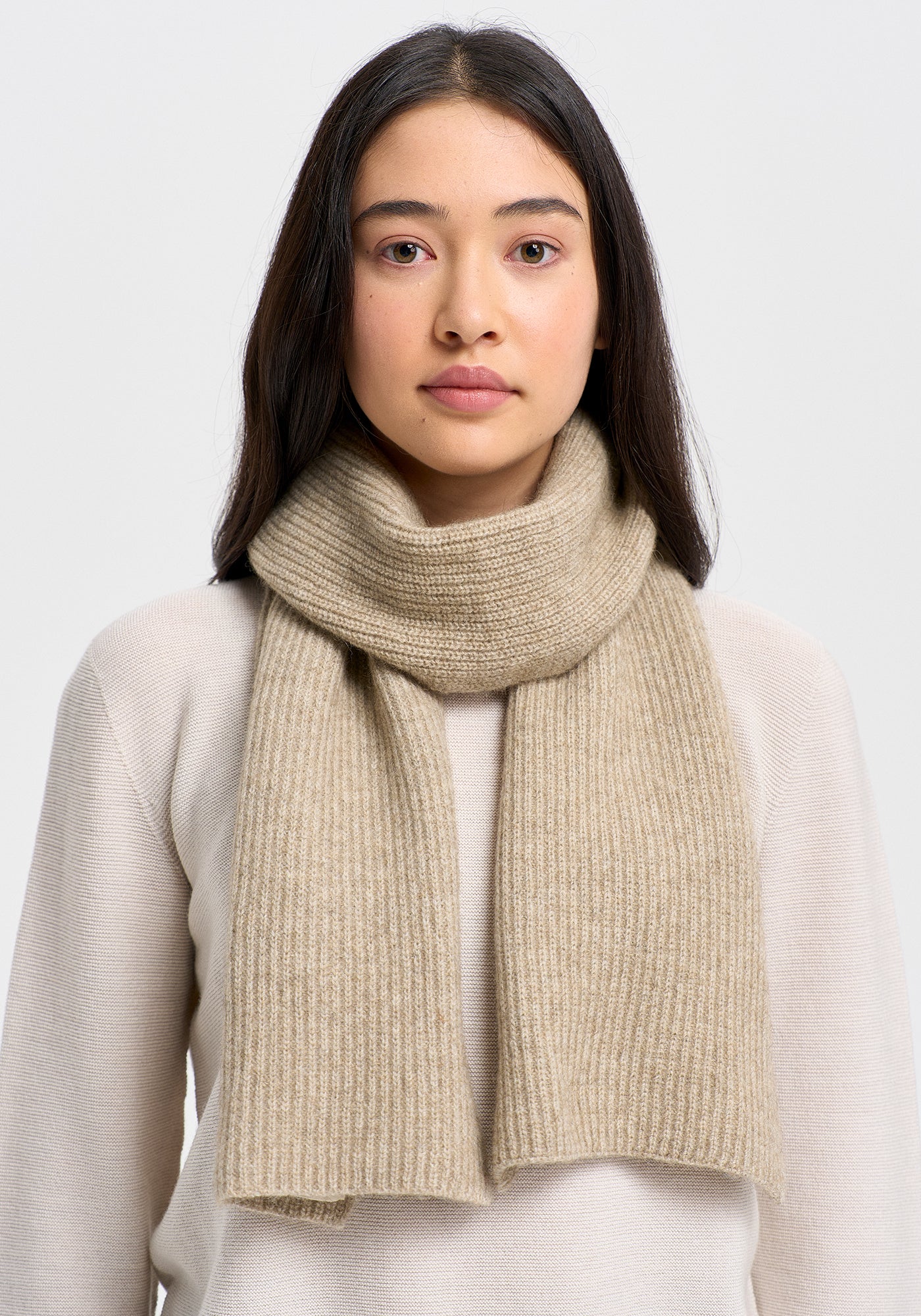Bleep Scarf available shopology Christchurch, CBD.  This is one of our most popular unisex scarves made from Untouched World's beautiful Ecopossum™ blend of Merino, possum and silk. It’s pill resistant and itch free which is great for round your neck area. Suitable for men or women, it will add a great finishing touch to your winter outfit. 