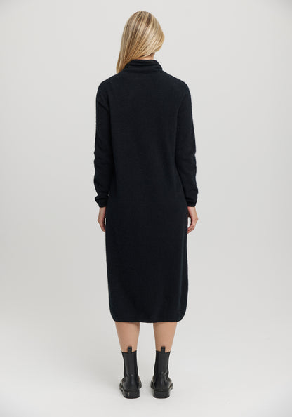 Kapua Sweater Dress from Untouched World, available shopology Christchurch CBD. With cocooning warmth, the Kapua™ Sweater Dress offers luxury like no other. Made from Untouched World's exclusive Kapua™ blend of 40% Premium Possum Fibre, 40% Cashmere and 20% Mulberry Silk Easy fit Soft mock neck Mid-length Microplastic-free Made in New Zealand Available in S - L