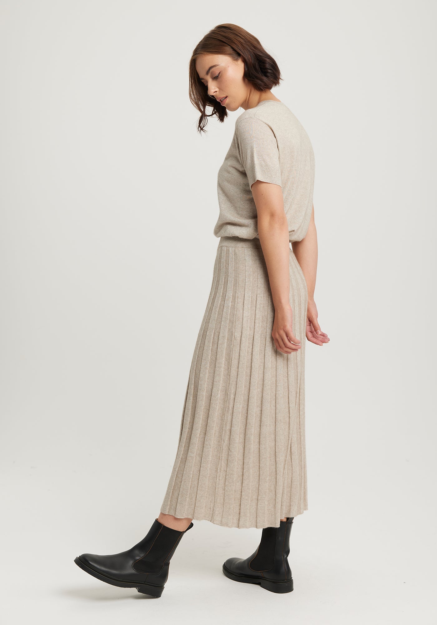 The Ella Skirt available shopology Christchurch, CBD.  Introducing the Ella Knit Skirt, made to pair with your EcoTree™ knits. Crafted from breathable TENCEL™, merino, and ultra-fine possum, it will keep you cosily cocooned in luxury. Featuring a wide waistband, it's all about style and luxury. It's the most comfortable skirt to wear, glides&nbsp; so nicely over your hips. Looks amazing with any of the EcoTree Knits.