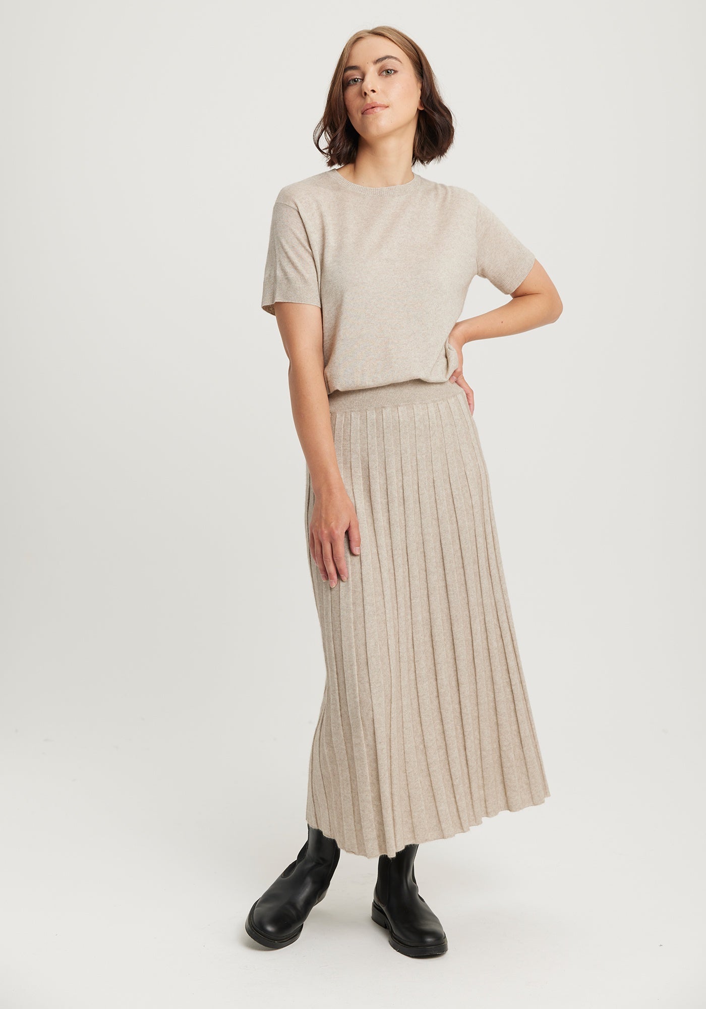 The Ella Skirt available shopology Christchurch, CBD.  Introducing the Ella Knit Skirt, made to pair with your EcoTree™ knits. Crafted from breathable TENCEL™, merino, and ultra-fine possum, it will keep you cosily cocooned in luxury. Featuring a wide waistband, it's all about style and luxury. It's the most comfortable skirt to wear, glides&nbsp; so nicely over your hips. Looks amazing with any of the EcoTree Knits.