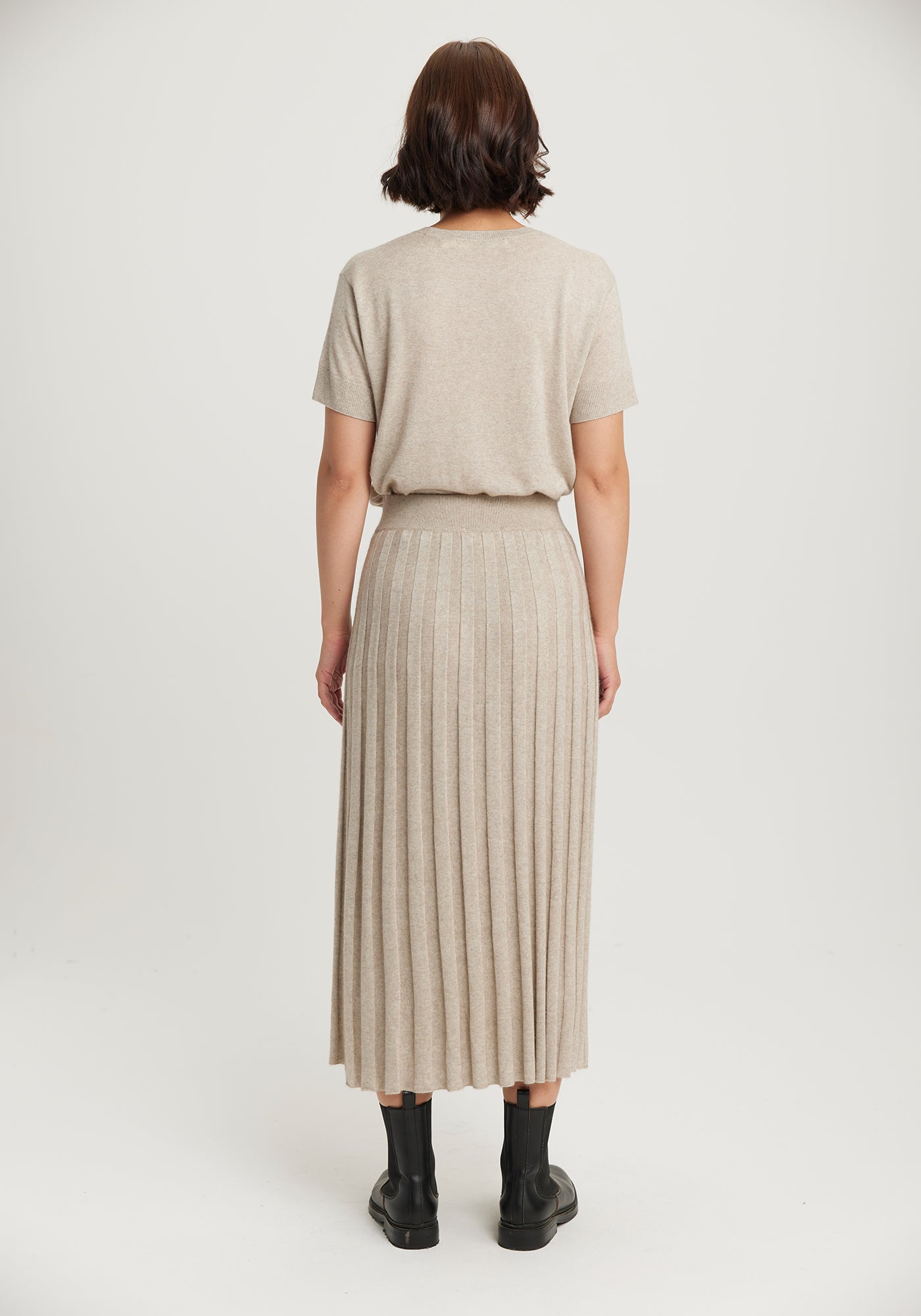 The Ella Skirt available shopology Christchurch, CBD.  Introducing the Ella Knit Skirt, made to pair with your EcoTree™ knits. Crafted from breathable TENCEL™, merino, and ultra-fine possum, it will keep you cosily cocooned in luxury. Featuring a wide waistband, it's all about style and luxury. It's the most comfortable skirt to wear, glides&nbsp; so nicely over your hips. Looks amazing with any of the EcoTree Knits.