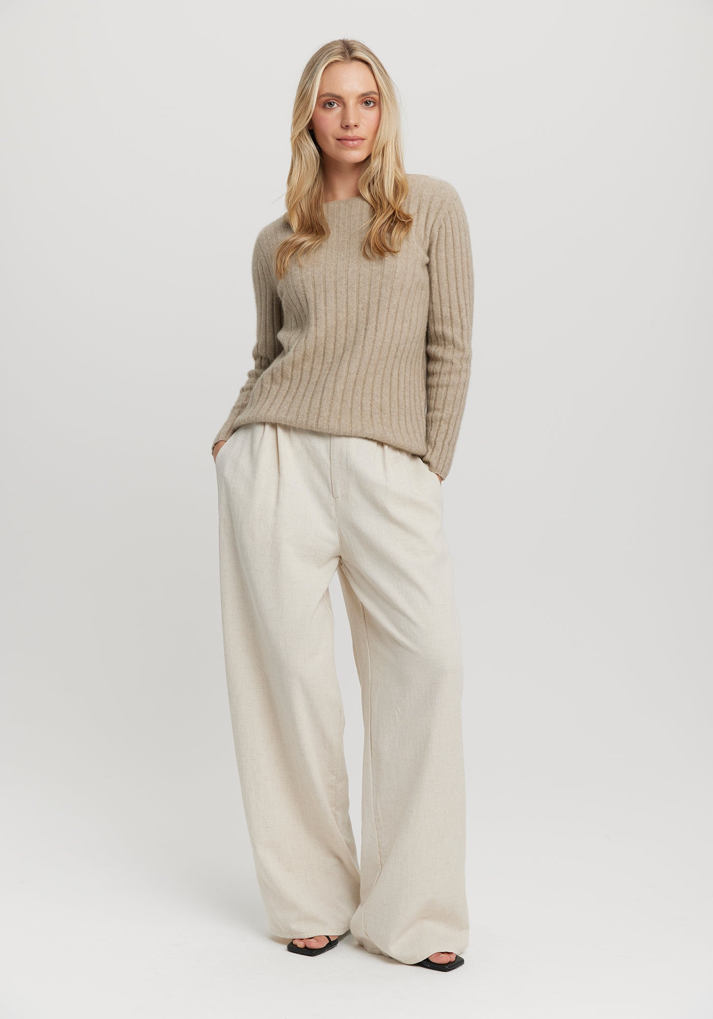 Kapua Rib Crew from Untouched World available shopology Christchurch, CBD.  Untouched World's flattering vertical ribbed Crew, skims your silhouette, can be worn dressy or casual.&nbsp; Layer it under the Kapua Wrap or Lounge Cardi, for a cosy, timeless and elevated ensemble. So delightfully soft you can wear it next to bare skin.  Made from our exclusive Kapua blend of 40% Premium Possum Fibre, 40% Cashmere and 20% Mulberry Silk Made in New Zealand Available in XS - XL