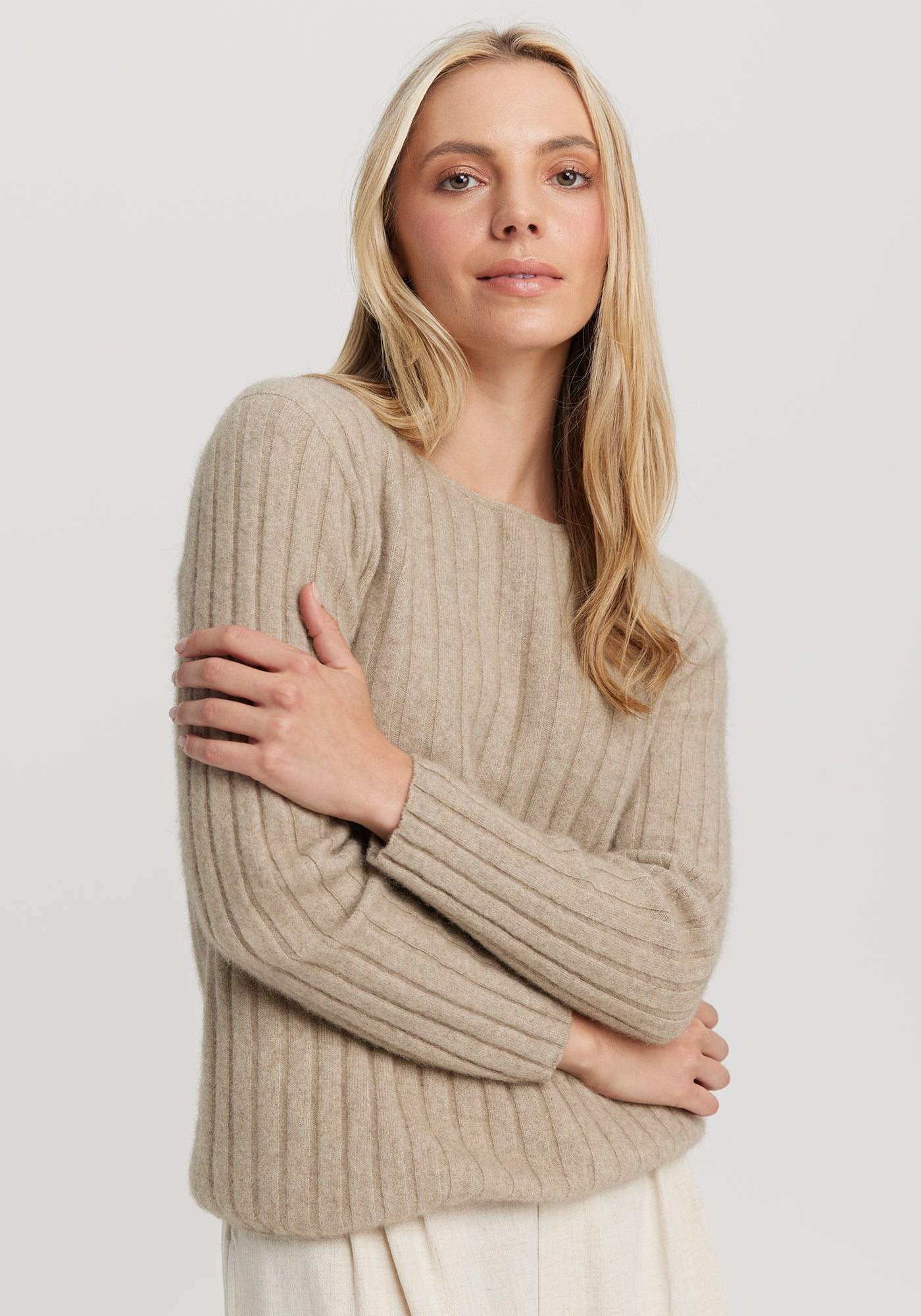 Kapua Rib Crew from Untouched World available shopology Christchurch, CBD.  Untouched World's flattering vertical ribbed Crew, skims your silhouette, can be worn dressy or casual.&nbsp; Layer it under the Kapua Wrap or Lounge Cardi, for a cosy, timeless and elevated ensemble. So delightfully soft you can wear it next to bare skin.  Made from our exclusive Kapua blend of 40% Premium Possum Fibre, 40% Cashmere and 20% Mulberry Silk Made in New Zealand Available in XS - XL
