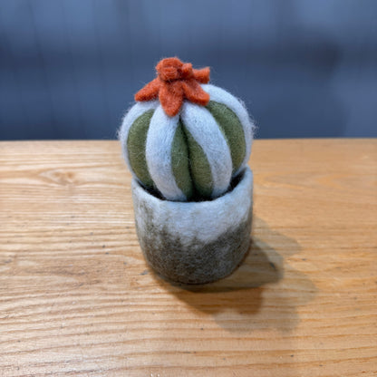 small felt cactus with orange flower.