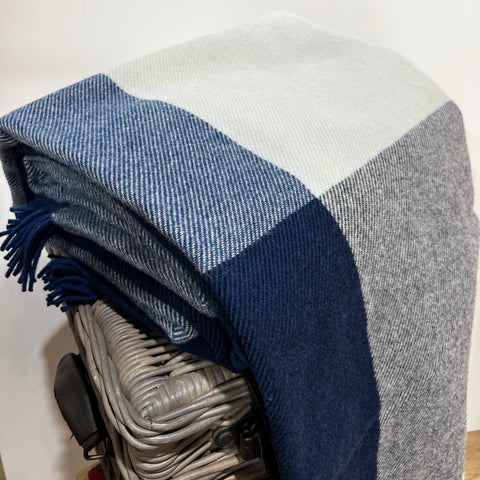 Buy this beautiful Blue and White soft block blanket is made from 100% soft pure lambs wool, grown, spun and woven entirely in New Zealand. Available at www.shopology.co.nz