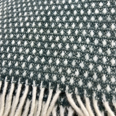 Knut Woven Wool Throw - Balsam Green. Available at www.shopology.co.nz 