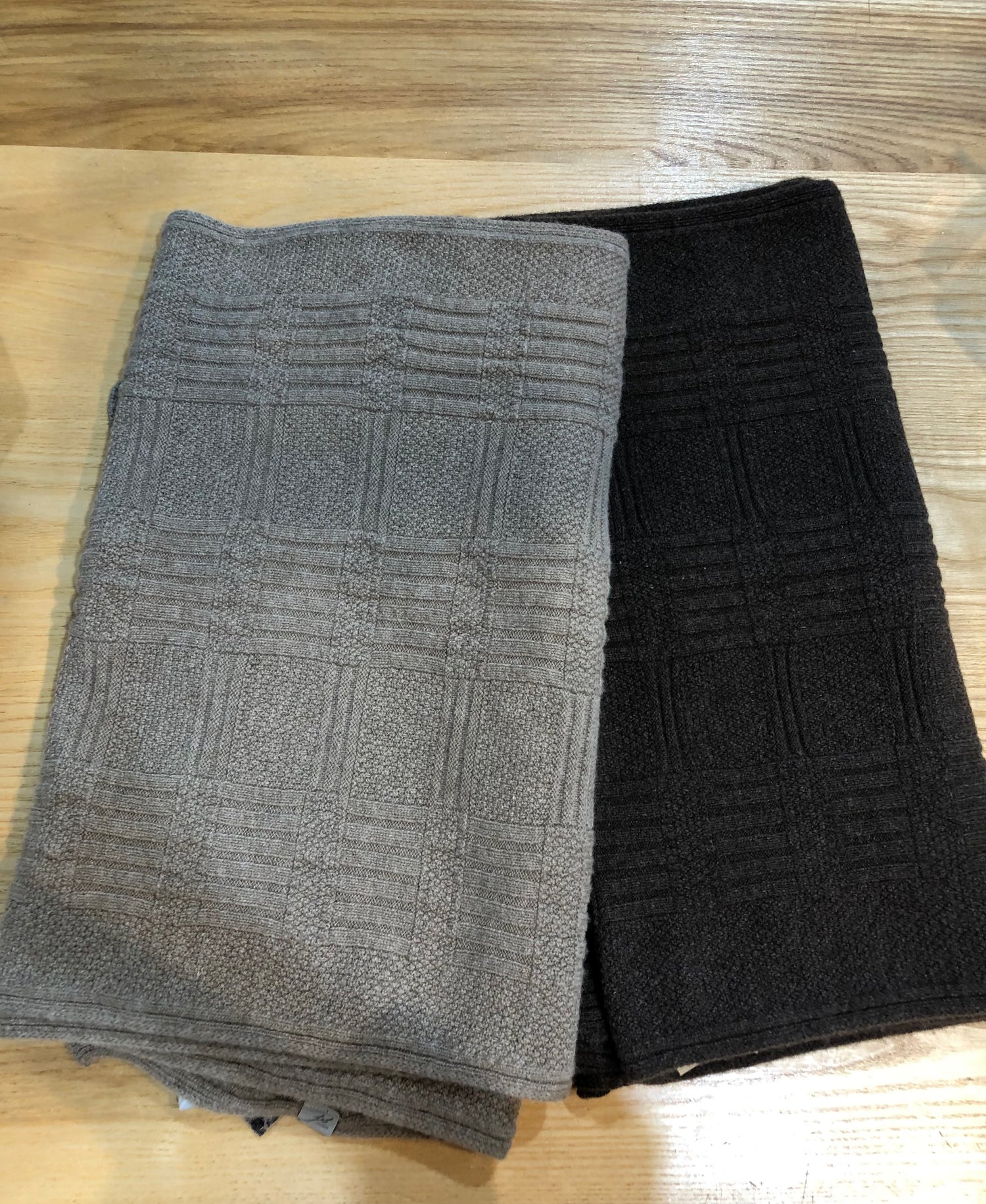 Natural Merino wrap scarf available exclusively shopology Christchurch CBD.  Natural, sustainable & traceable...  Beautiful Merino knitted Basket-weave wrap scarf proudly made in New Zealand. The rear naturally coloured Merino comes in shades of chocolate to silver. A wonderful gift from New Zealand.  Size: length 220cm, width 45cm