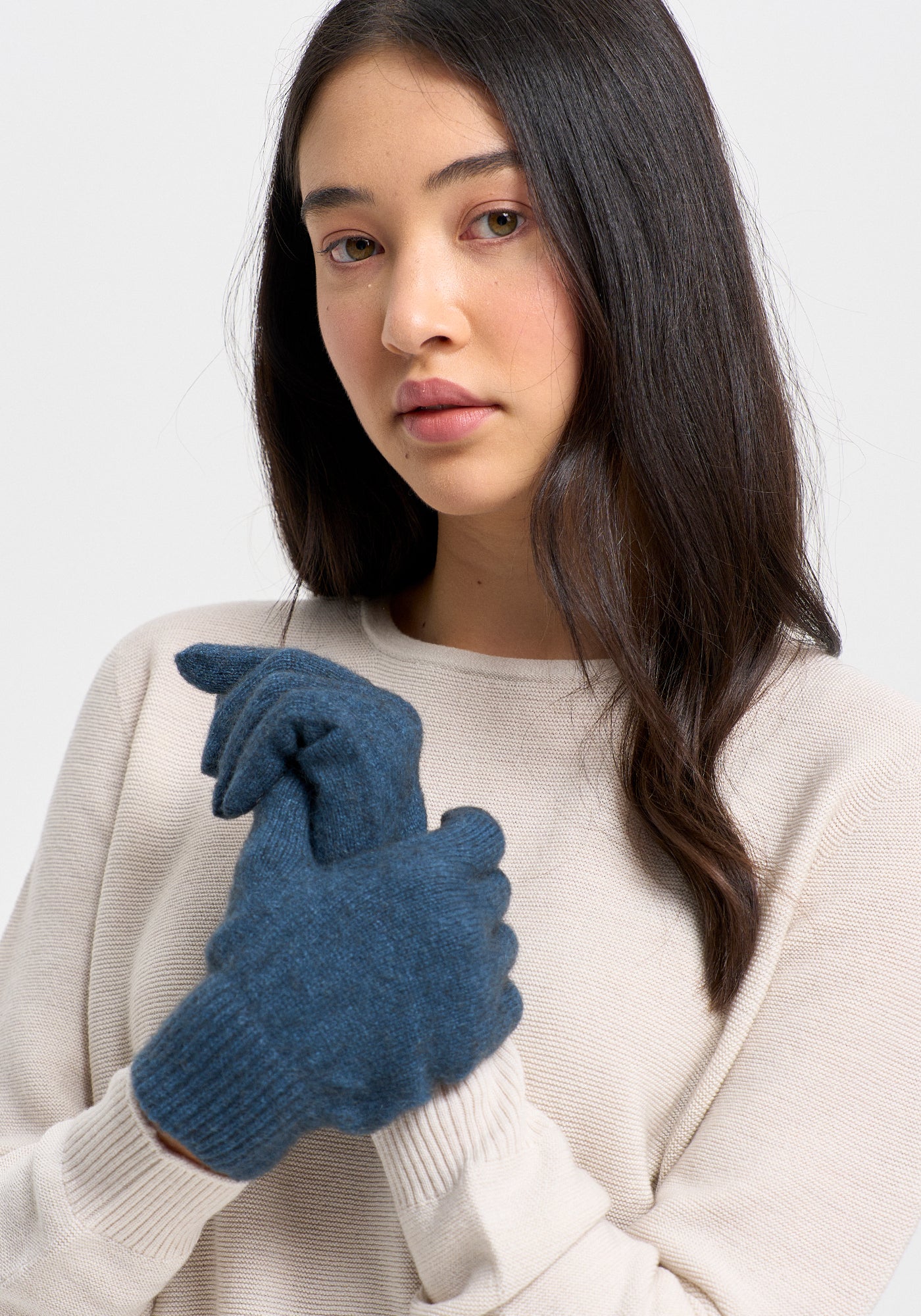 Cosy gloves using exclusive Ecopossum blend, Untouched World, 50% merino, 40% possum & 10% mulberry silk blend, made in New Zealand, premium blend of fine ZQ certified merino, brush tail possum, featherweight softness with warmth & durability, luxurious, pill resistant, eco & sustainable, gift, New Zealand wool product, knitwear, wool, washable, Shopology, tourist, sustainable, stylish, natural, merino yarn, lightweight, itch-free, fashion, easy-care, unisex gloves, local, exclusive CBD, Canterbury made