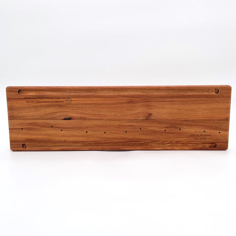 Rimu Serving board with groove handmade by local Artisan craftsman available shopology.  Such a versatile Serving board, can be used for many uses.   Made locally from native New Zealand Rimu wood, recycled from the Christchurch earthquake in 2011. All Serving boards are hand made, so know two boards will be the same. Will last for generations to come. An ideal gift.  Two lengths / 50cm & 70cm, width 19.5cm, depth 1.5cm  , made i New Zealand, local