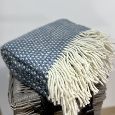 These beautiful and luxurious woven wool throws are made with New Zealand lambswool which can be traced back to the individual farm. The Knut blanket features a subtle woven spot design with contrasting cream fringing. Soft and cosy lambswool has been sourced from sheep farmers in New Zealand using high, eco-friendly standards. They keep you warm on cold winter days or nights and become a nice and timeless detail on your sofa or bed. Available at www.shopology.co.nz