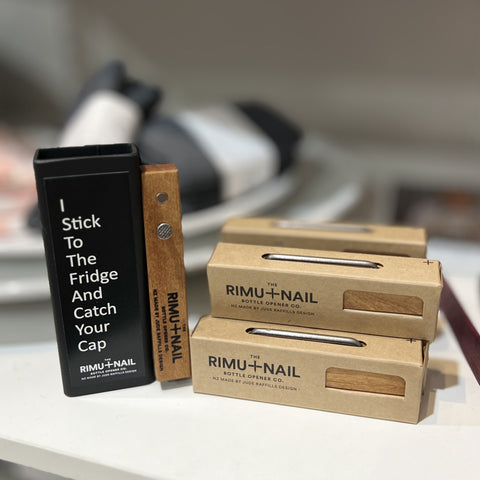 The Rimu & Nail Bottle Opener is handmade from NZ Rimu. A four inch builder's nail wraps around the timber and it has one magnet to catch the cap and a second magnet to hold it to the fridge.