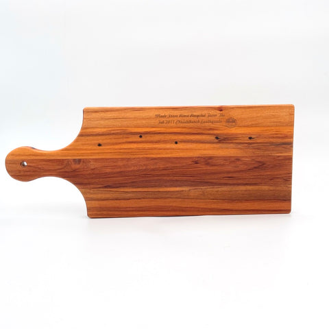 Rimu cheese board with handle, Canterbury made, made in New Zealand, shopology, local, recycled from the Christchurch earthquake in 2011. Beautiful boards with a story that you can use everyday, native New Zealand rimu, The Cheeseboard measures: length 44.5cm ( to tip of handle ), length 32cm, width 17cm, depth, 1.5cm, measurements may vary as handmade, artisan, sustainable