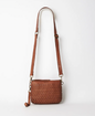 Woven leather pouch bag available shopology, Christchurch CBD.  With it's thin leather weave, this bohemian design is the ideal summer accessory. Wear as a shoulder bag or crossbody by adjusting the strap, or use the wrist strap for use as a clutch or purse.  25CM x 18CM x 8CM Multi-textured (woven leather front and flat leather back) Zipper closure One internal zip pocket 