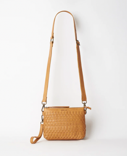 Woven leather pouch bag available shopology, Christchurch CBD.  With it's thin leather weave, this bohemian design is the ideal summer accessory. Wear as a shoulder bag or crossbody by adjusting the strap, or use the wrist strap for use as a clutch or purse.  25CM x 18CM x 8CM Multi-textured (woven leather front and flat leather back) Zipper closure One internal zip pocket 