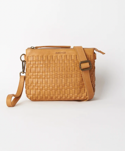 Woven leather pouch bag available shopology, Christchurch CBD.  With it's thin leather weave, this bohemian design is the ideal summer accessory. Wear as a shoulder bag or crossbody by adjusting the strap, or use the wrist strap for use as a clutch or purse.  25CM x 18CM x 8CM Multi-textured (woven leather front and flat leather back) Zipper closure One internal zip pocket 