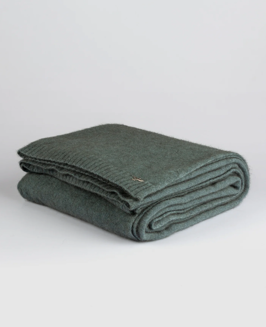 Luxurious Throw exclusive Ecopossum blend, Untouched World, 50% merino, 40% possum & 10% mulberry silk blend, made in New Zealand, premium blend of fine ZQ certified merino, brush tail possum, featherweight softness with warmth & durability, pill resistant, eco & sustainable, gift, New Zealand wool product, knitwear, wool, washable, Shopology, tourist, sustainable, stylish, natural, merino yarn, lightweight, itch-free, fashion, easy-care, local, exclusive CBD, made in Canterbury.  www.shopology.co.nz