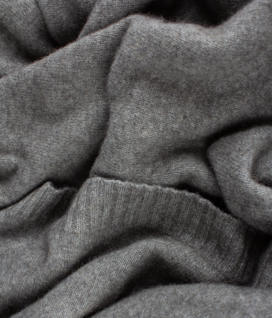 Luxurious Throw exclusive Ecopossum blend, Untouched World, 50% merino, 40% possum & 10% mulberry silk blend, made in New Zealand, premium blend of fine ZQ certified merino, brush tail possum, featherweight softness with warmth & durability, pill resistant, eco & sustainable, gift, New Zealand wool product, knitwear, wool, washable, Shopology, tourist, sustainable, stylish, natural, merino yarn, lightweight, itch-free, fashion, easy-care, local, exclusive CBD, made in Canterbury. www.shopology.co.nz