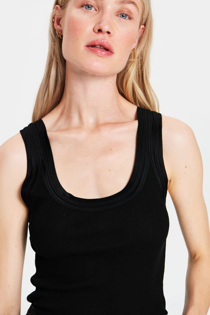 Maya Tank Top by Saint Tropez available shopology, Christchurch CBD.  Maya tank top is more like a singlet top. Looks great bunched up or worn long. Neckline &amp; armhole finished with double layer Satin binding. Designed to sit perfectly under your arm. Scooped front neckline &amp; a straight back neckline.  Looks fabulous worn on it's own or under a Jacket or Cardigan.  70% Cotton, 30% Silk.