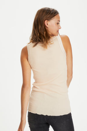 Maya Tank Top by Saint Tropez available shopology, Christchurch CBD.  Maya tank top is more like a singlet top. Looks great bunched up or worn long. Neckline &amp; armhole finished with double layer Satin binding. Designed to sit perfectly under your arm. Scooped front neckline &amp; a straight back neckline.  Looks fabulous worn on it's own or under a Jacket or Cardigan.  70% Cotton, 30% Silk.